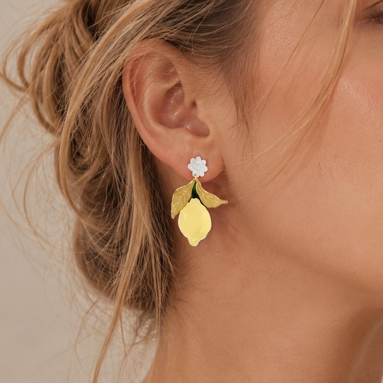 Yellow Lemon Acrylic Dangle Earrings with Gold Tone Leaves | White flower tops, gold tone leaves and yellow lemon drops; playful summer style for birthdays, vacations and daily outfits