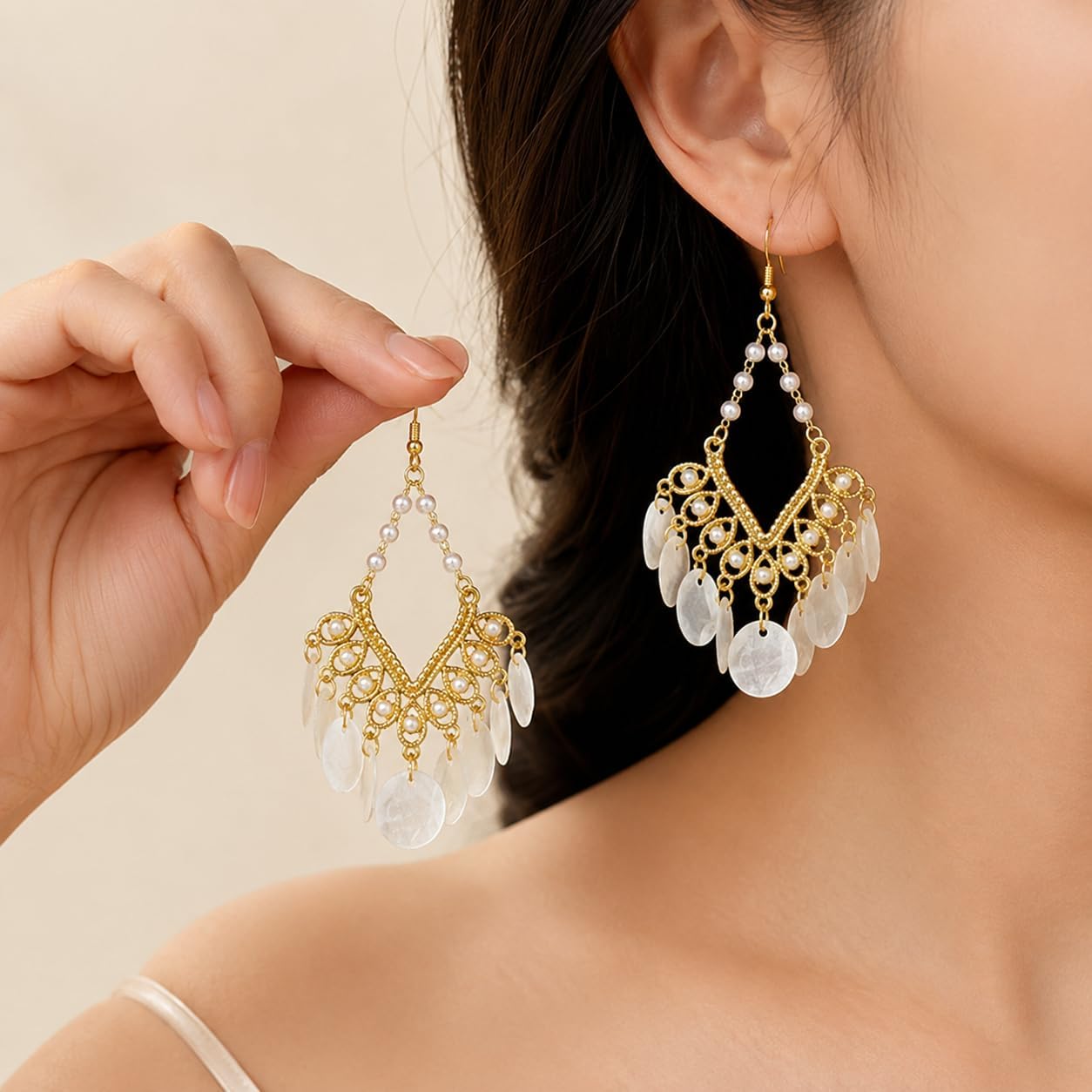 Boho Pearl Shell Dangle Earrings for Women, Gold Chandelier Drop Earrings | Lightweight statement earrings with white shell disc fringe, ideal for summer beach vacations, bohemian outfits and gifting.