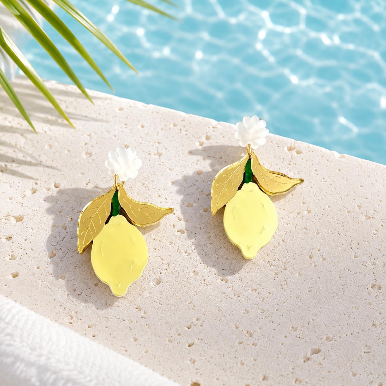 Yellow Lemon Acrylic Dangle Earrings with Gold Tone Leaves | White flower tops, gold tone leaves and yellow lemon drops; playful summer style for birthdays, vacations and daily outfits